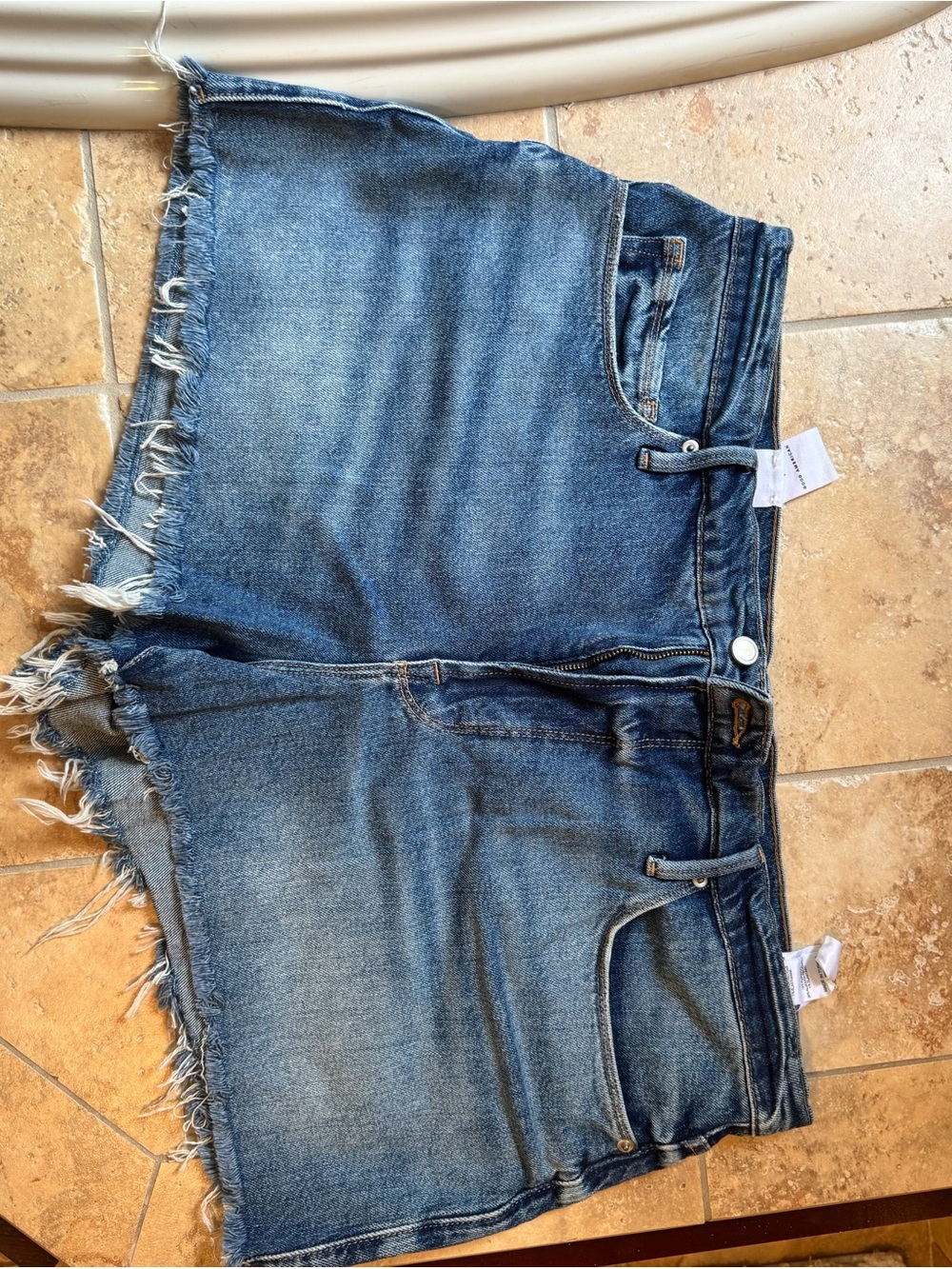 Good American Blue Denim Cutoff Shorts with Frayed Hem
